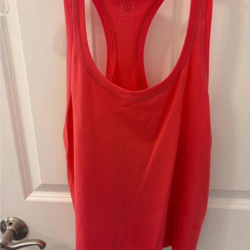 lululemon athletica Racerback Tank Top
Swiftly hip length